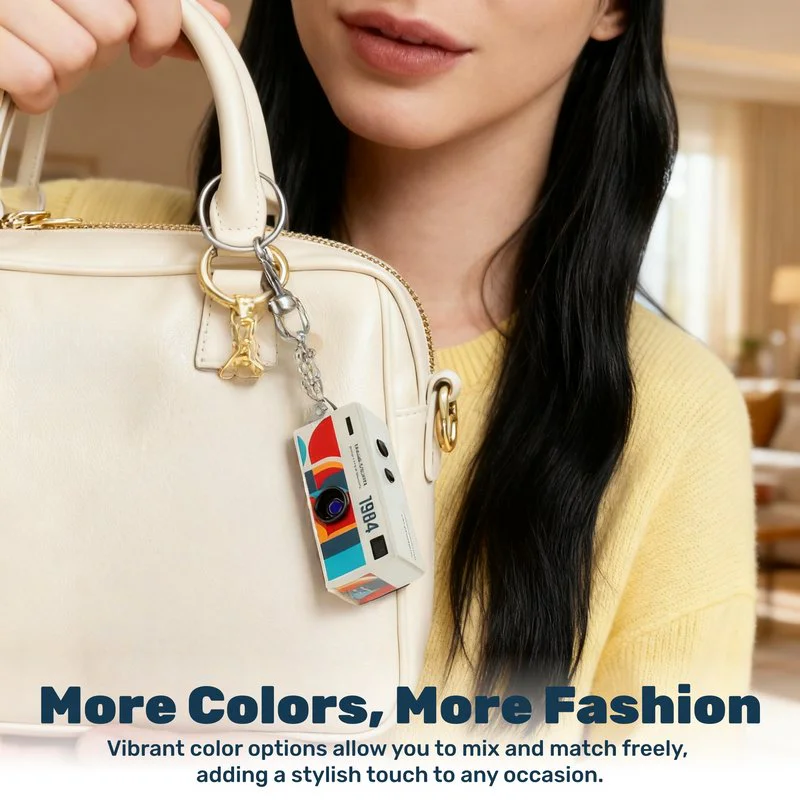 AC-G6 mini camera attached to a handbag